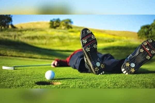 Golfer after being hit by a golf ball